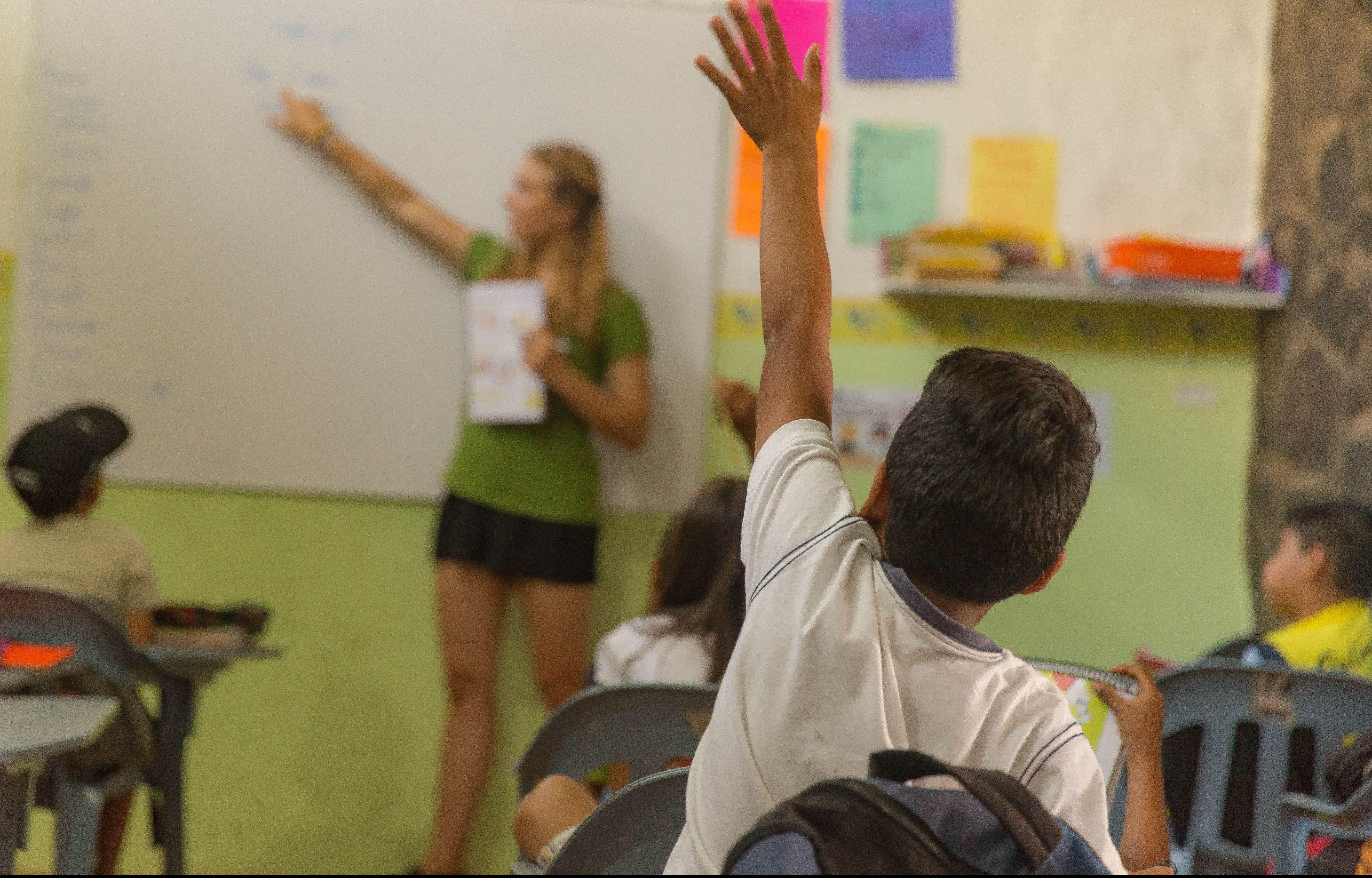 While studying Spanish in Ecuador with Projects Abroad, a student also volunteers as an English teacher in a local school with young children. A volunteer splits her time between teaching English at a local school and learning Spanish in Ecuador.